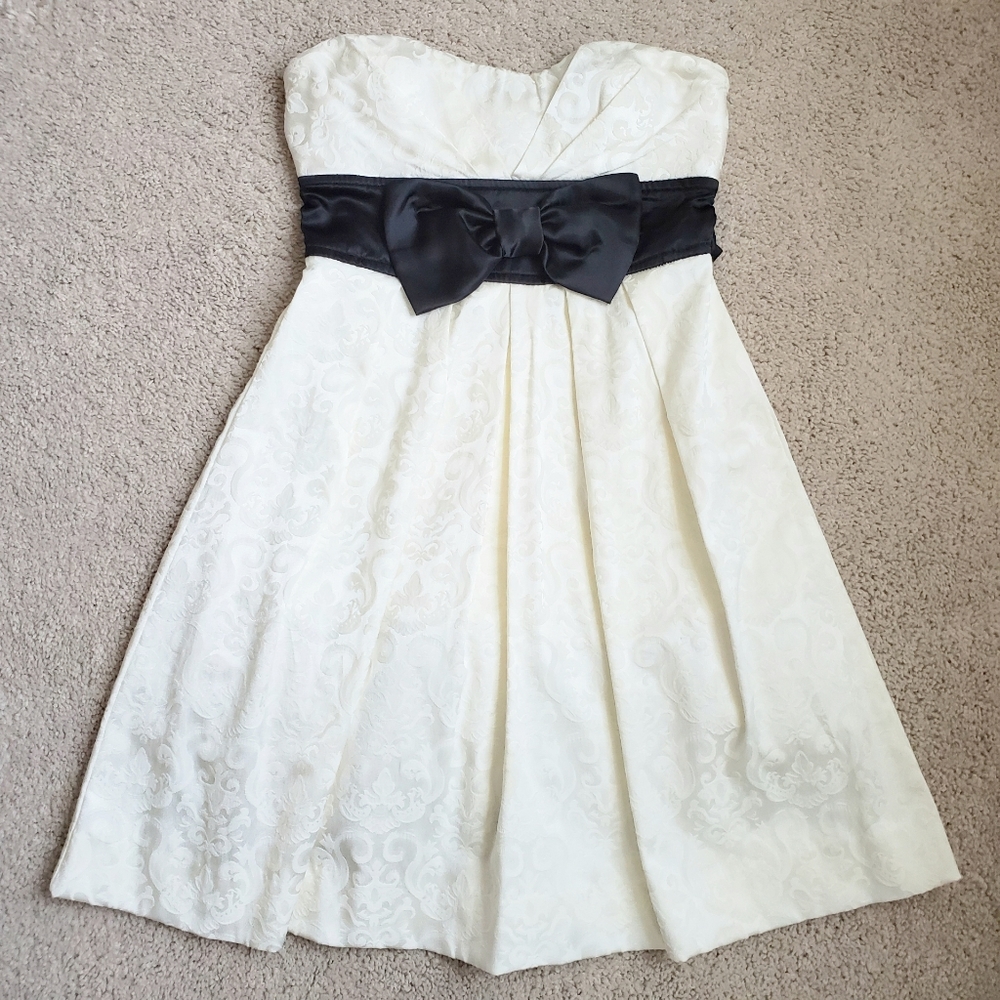 Off-White Mini Dress with Black Bow